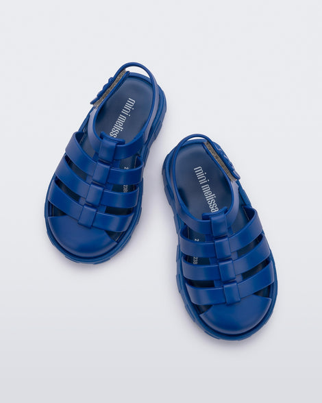Top view of a pair of blue Megan baby sandals.