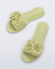 Top view of a pair of green Babe Petals slide sandals
