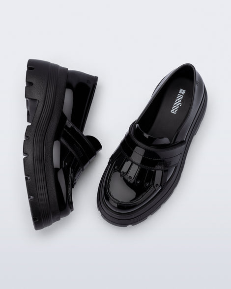 Top and side view of a pair of black Royal Plus Platform loafers