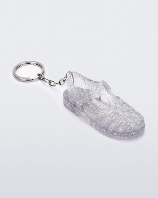 angled view of glitter clear Possession keyring
