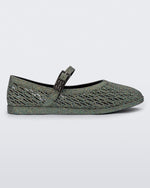 Side view of a dark silver glitter Harper flat with strap