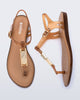 Side and top view of a pair of brown Solar M Chic sandals with gold embellishment