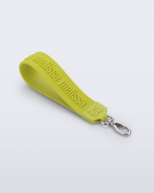 Angled flat view of a green M Lover Charm with the Melissa logo