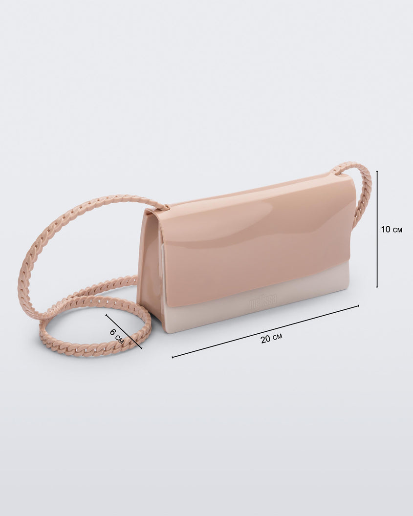 Angled view of the Melissa party handbag in beige with measurements of 20 cm width, 10 cm height, 6 cm depth