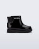 Side view of a black Chelsea II baby boot