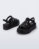Back and angled view of a pair of black Up Platform sandals