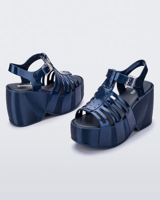 Product element, title Station 79 in Pearly Blue
 price $129.00