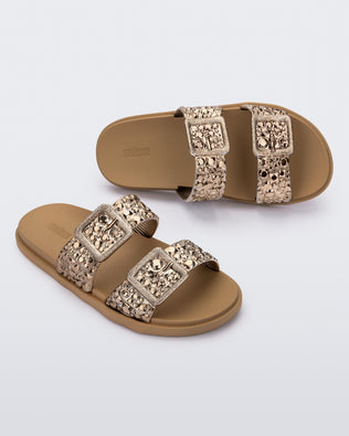 Product element, title Lust Slide in Beige/Bronze
 price $34.50
