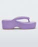 Side view of a Melissa Free platform flip flop in lilac with tan sole