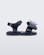 Side view of the Mini Melissa Mar Sandal with star print for baby in blue with butterfly bow applique and velcro closure on ankle strap.