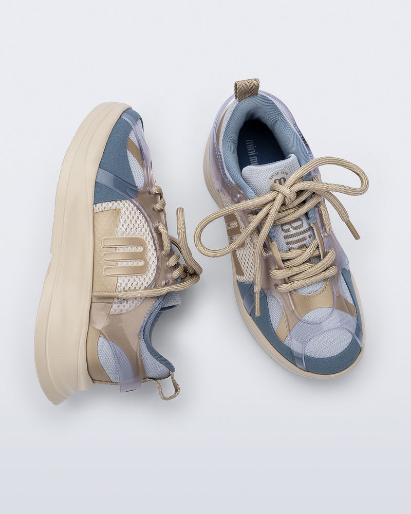 Side and top view of a pair of blue X Beat kids sneakers with beige trim