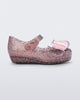 Side view of a clear/glitter pink Ultragirl Butterfly baby ballerina flat with pink butterflies
