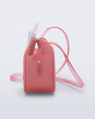 Side view of a pink glitter Dreamy Unicorn kids bag with a unicorn face on front with pink hair