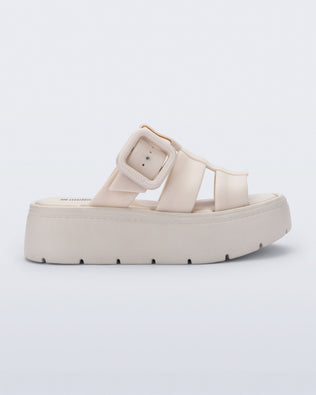 Side view of a beige Pump Platform sandal