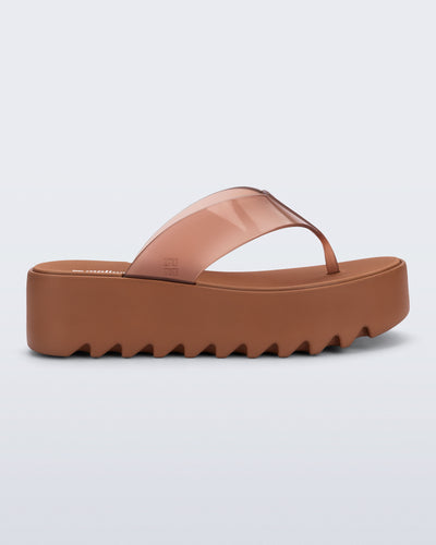 Side view of a brown Thong Platform flip flop