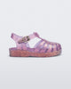 Side view of a glitter lilac baby Possession sandal
