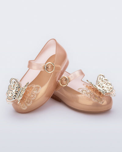 Angled view of a pair of gold Sweet Love baby Butterfly flats