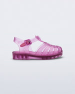 Side view of transparent pink Possession fisherman baby sandal