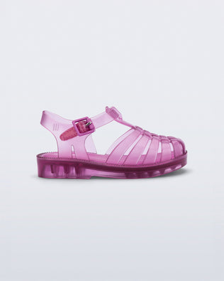Side view of transparent pink Possession fisherman baby sandal