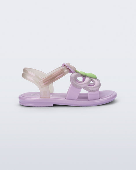 Side view of a lilac Hip Butterfly baby sandal