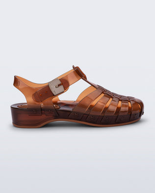 Side view of a clear brown Possession Pescura + Scholl fisherman sandal with white bottom sole
