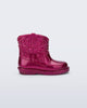 Side view of a glitter pink Texas baby boot