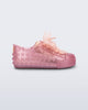 Side view of a pearly pink Polibolha baby sneaker with laces.