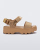 Side view of a gold kids Kick Off Sandal