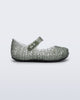 Side view of a glitter green Campana baby flat