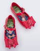 Top view of a pair of red Sweet Love Snow White baby flats with a red bow with red apple center