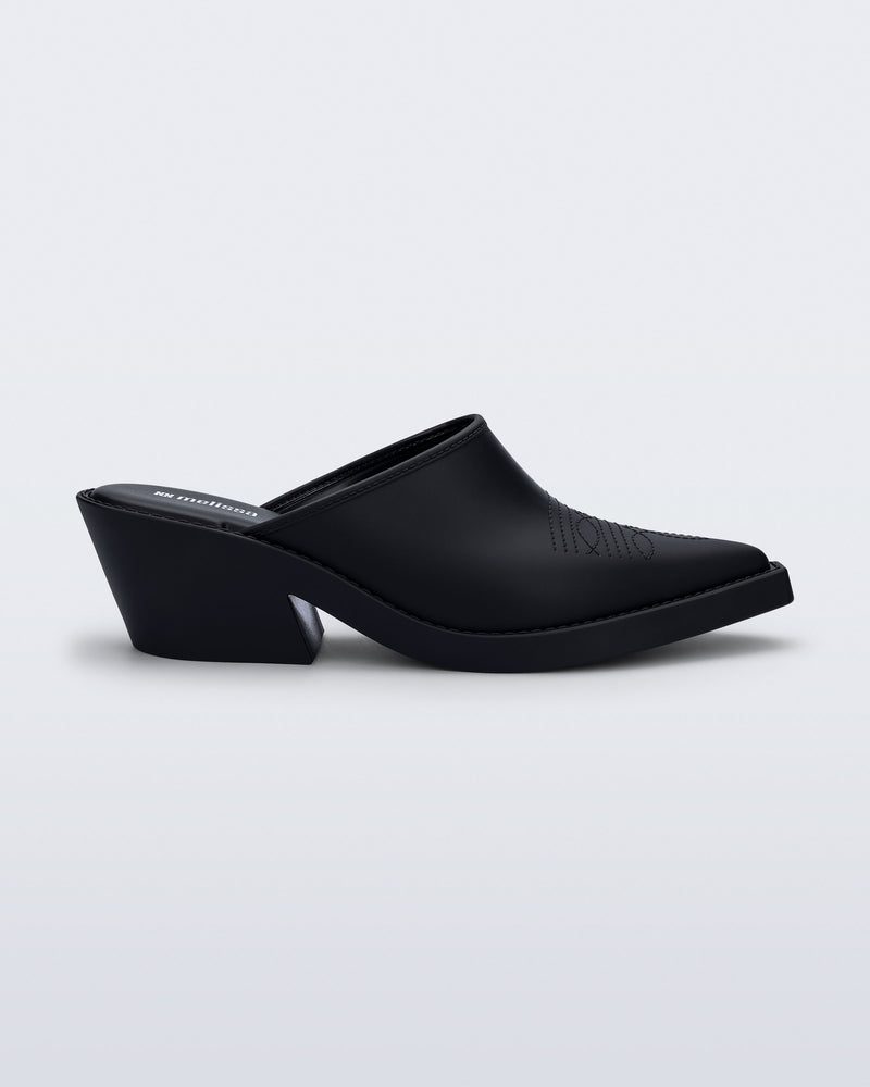 Side view of a matte black Texas mule