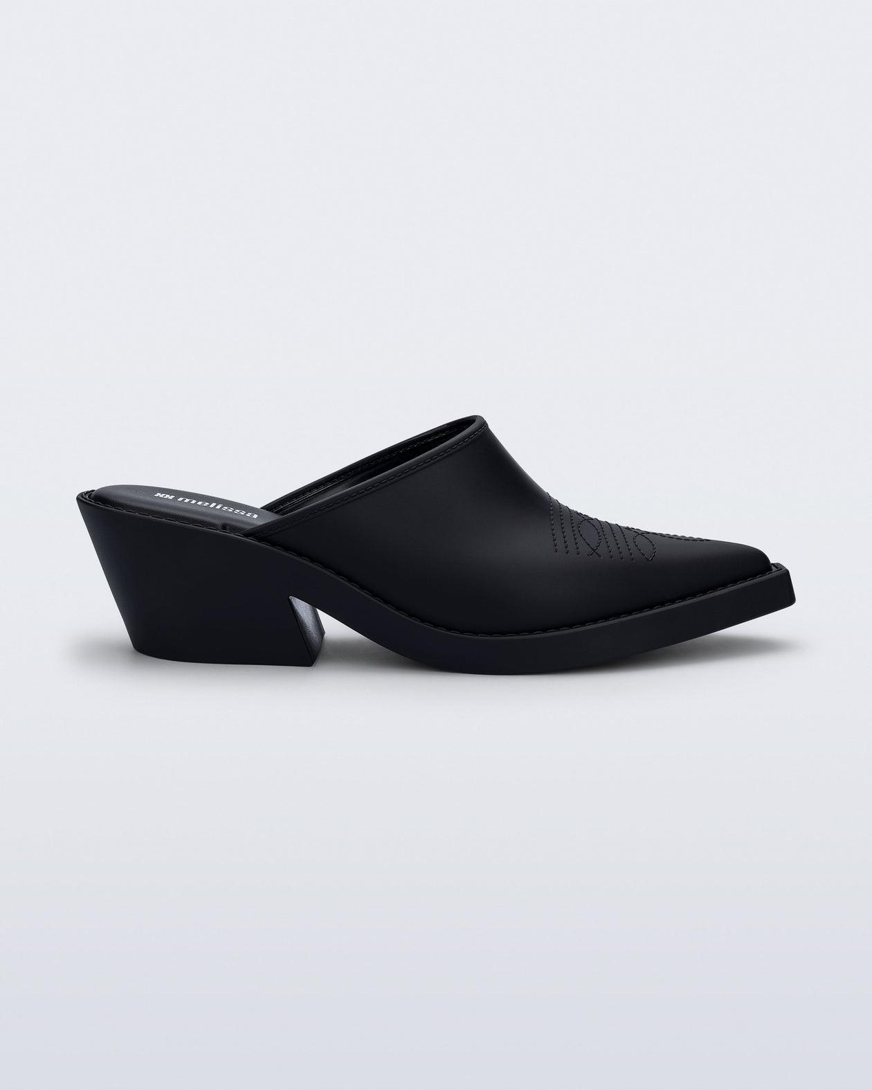 Side view of a matte black Texas mule