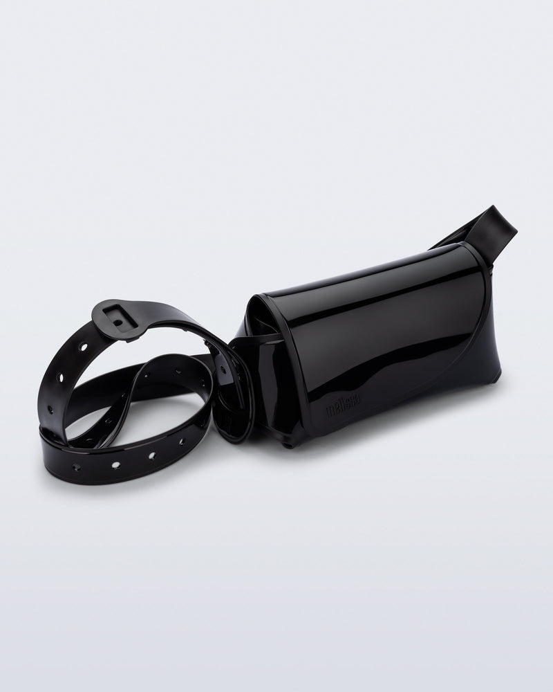 Angled view of a black Cross Bag with adjustable strap