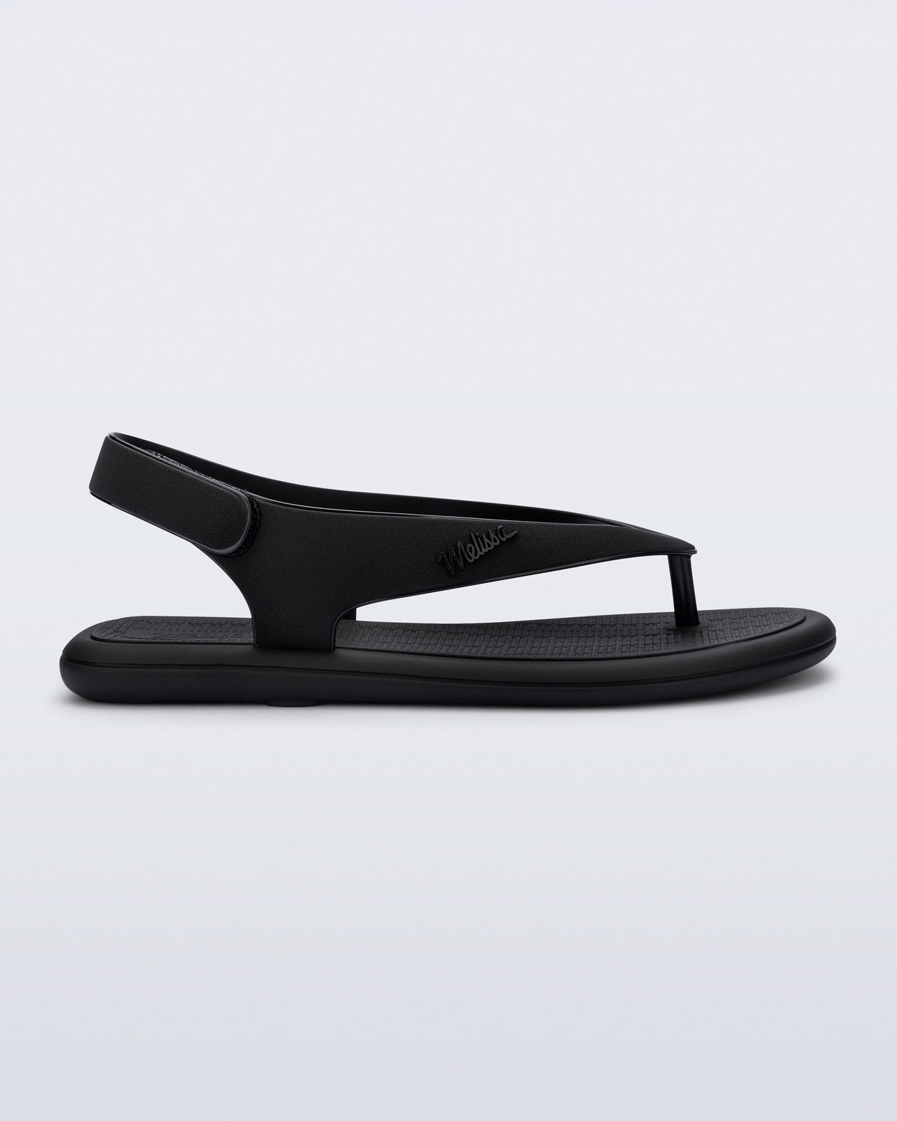 Side view of a black Sun Samba thong sandal
