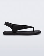 Side view of a black Sun Samba thong sandal