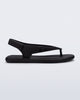 Side view of a black Sun Samba thong sandal