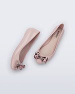 Side and top view of a pair of pink Sweet Love Glam ballerina flats with pink chrome bow