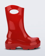 Side view of a red Ultra platform rain Boot with circle cutout on top