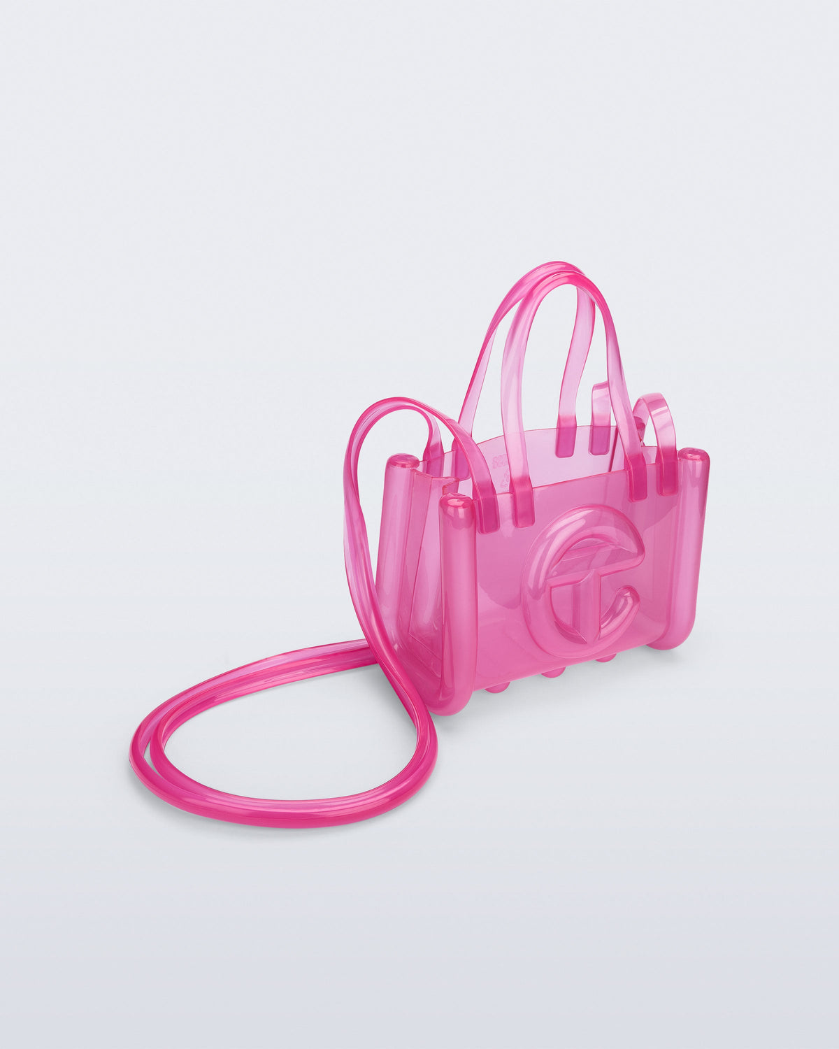 Angled view of the pink Small Jelly Shopper x Telfar bag