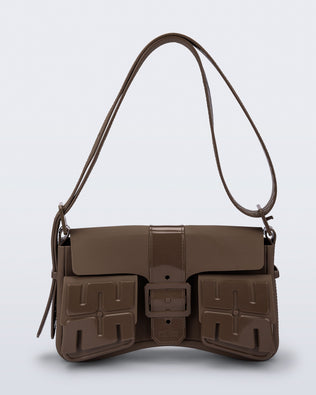 Front view of a brown Cargo bag with two small pockets on the front and an adjustable strap