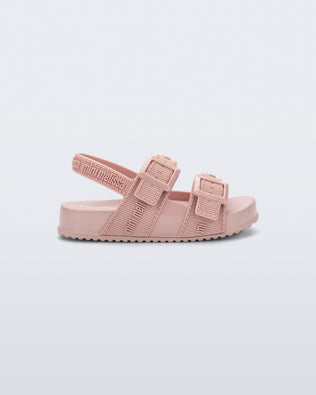 Side view of a pink Cozy M Lover baby sandal
