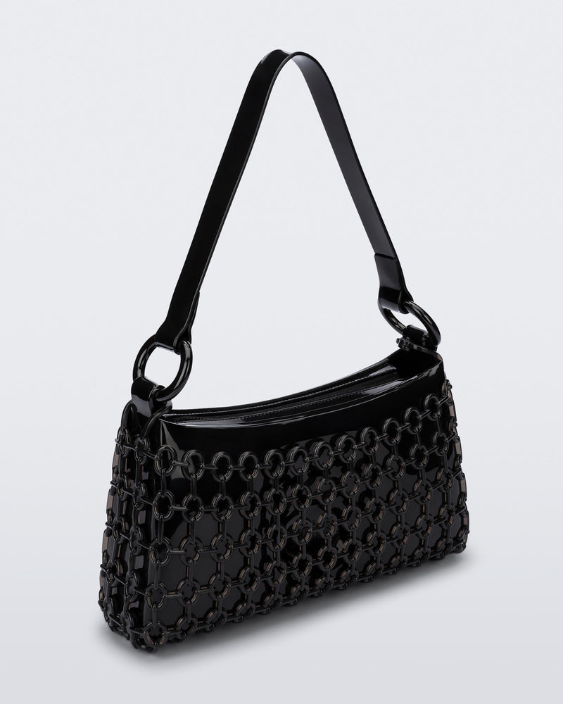Angled view of a black Hoop bag with short shoulder strap