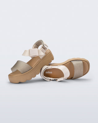 Top and side view of a pair of beige/glitter Kick Off Sandals