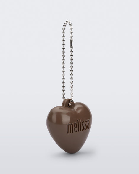 Angled view of a brown Heart Charm