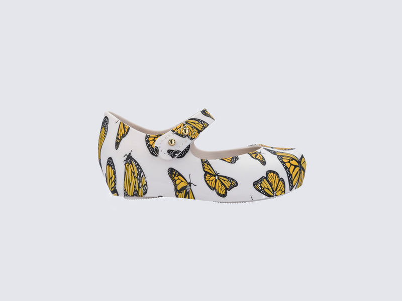 Side view of a white Ultragirl Print baby ballerinas with orange and black butterflies
