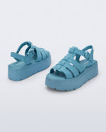 Back and angled view of a pair of blue Up Platform sandals