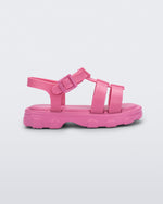 Side view of a pink Ella baby sandal with ankle strap