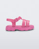 Side view of a pink Ella baby sandal with ankle strap
