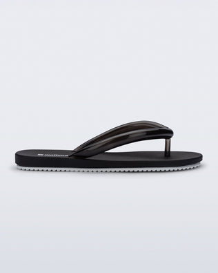 Product element, title Flip Flop Airflow in Black/White
 price $49.00