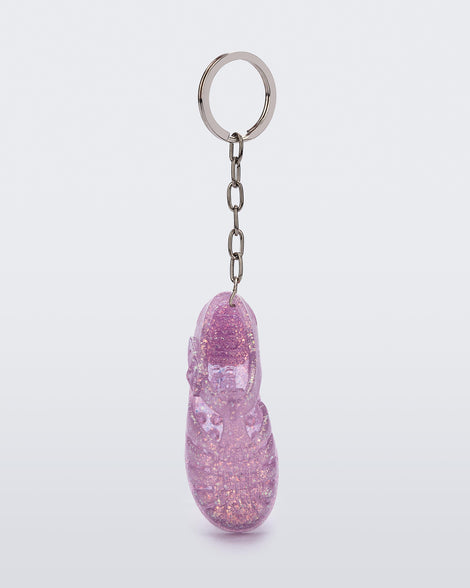 Front view of glitter lilac Possession keyring